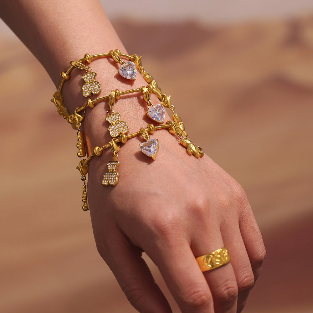 Bracelet Charms d'Or  Acier inoxydable doré et zircon, breloques cœur, papillon et ourson