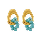 Boucles d'oreilles Aura Bleu  Acier inoxydable doré et perles turquoise