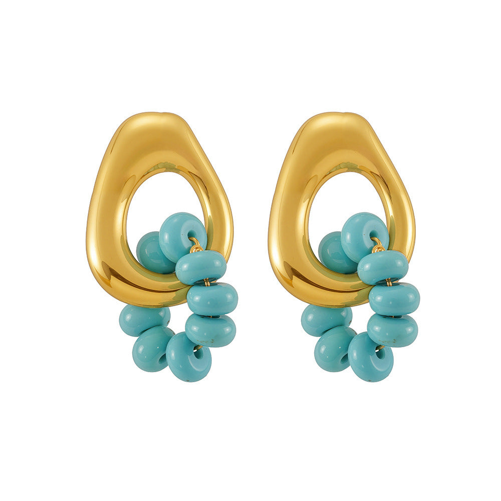 Boucles d'oreilles Aura Bleu  Acier inoxydable doré et perles turquoise
