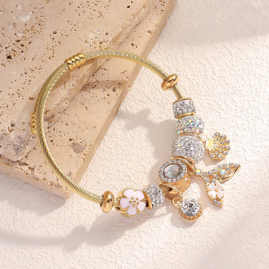 Bracelet femme en acier inoxydable doré  Charms coquillage & queue de poisson