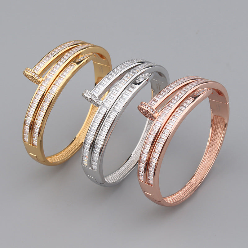 Bracelet Femme en Acier Inoxydable Sertis de Zircons – Disponible en Doré, Argenté ou Or Rose