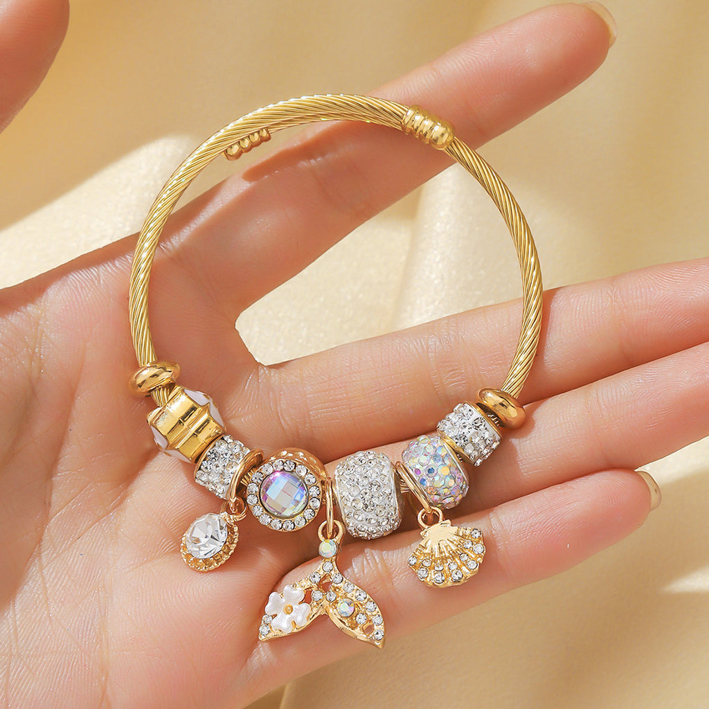 Bracelet femme en acier inoxydable doré  Charms coquillage & queue de poisson