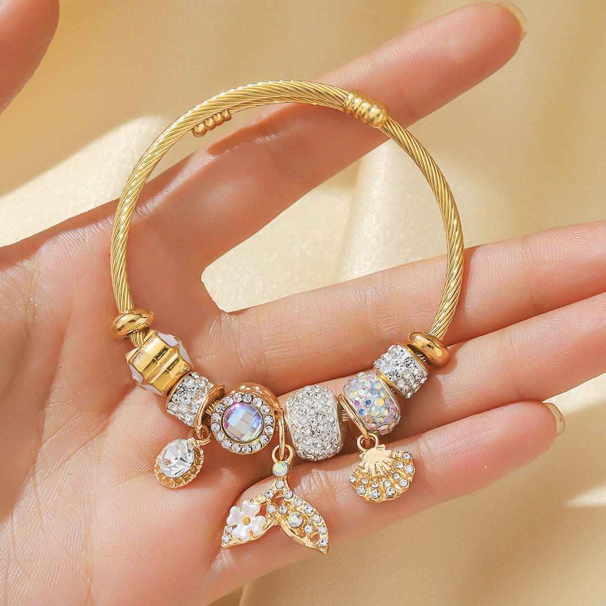 Bracelet femme en acier inoxydable doré  Charms coquillage & queue de poisson