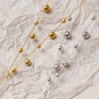 Collier long femme en acier   Chaîne gouttes multiples dorée ou argentée, style chic et tendance 18K