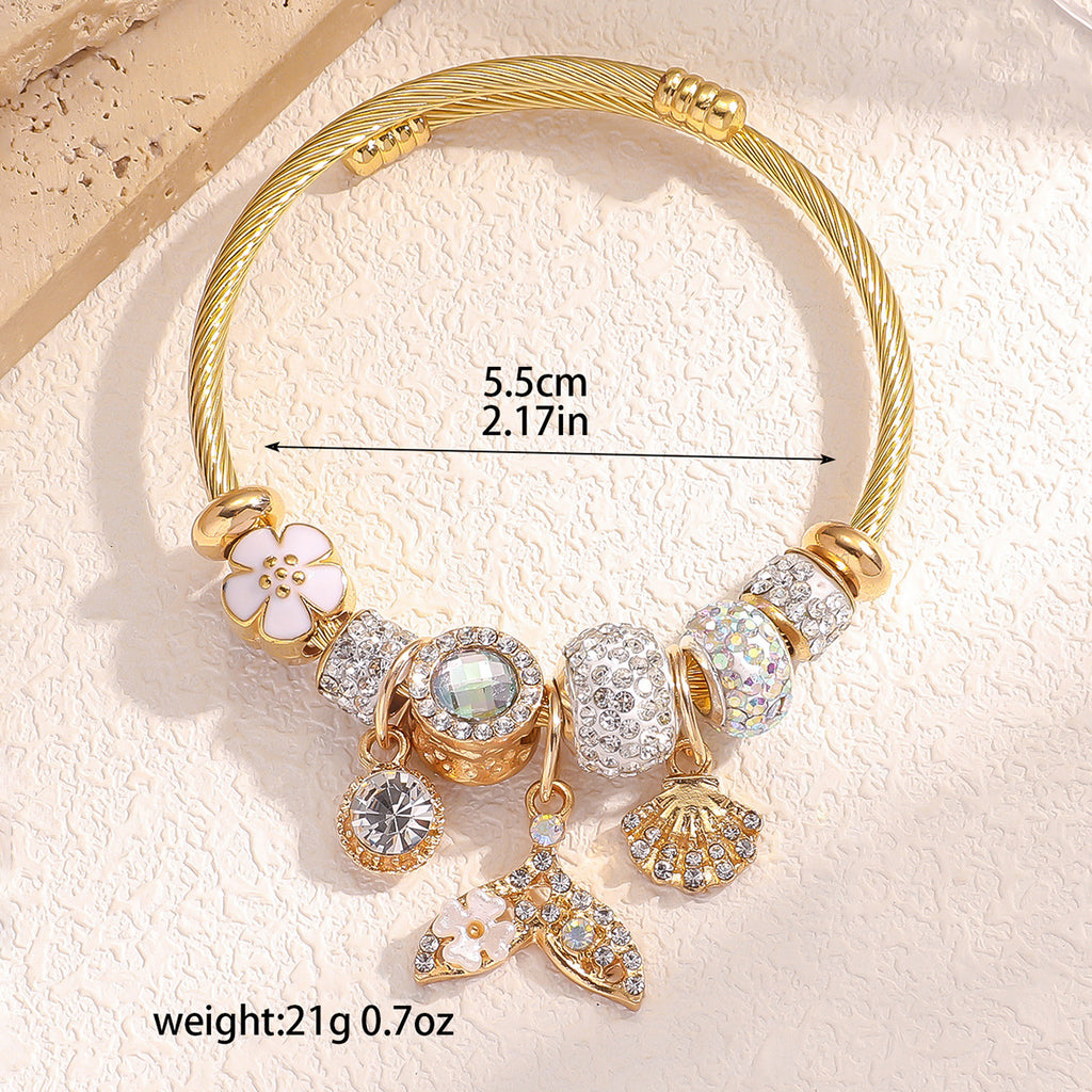 Bracelet femme en acier inoxydable doré  Charms coquillage & queue de poisson