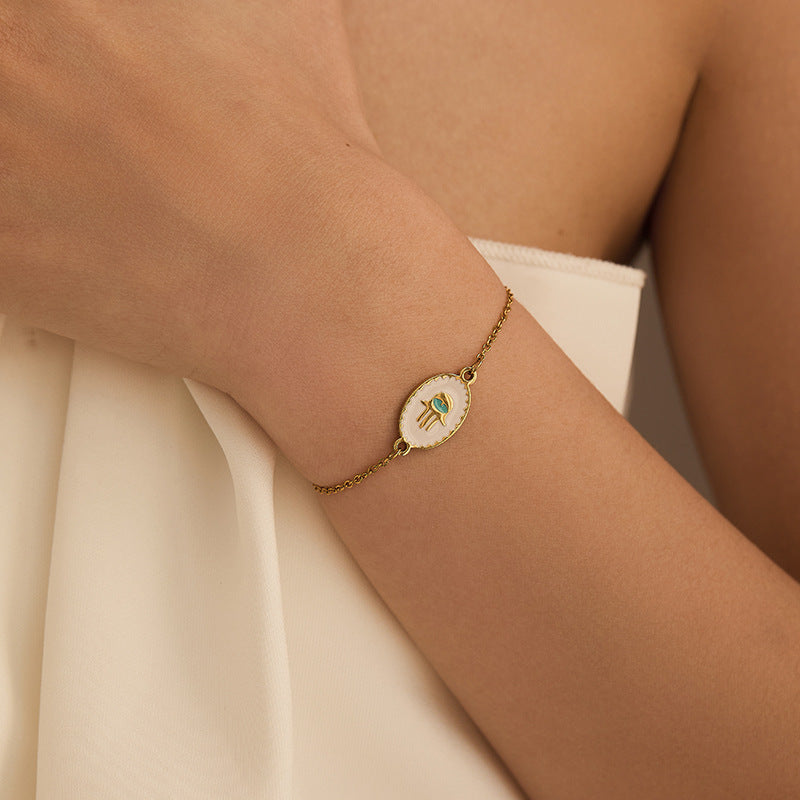 Bracelet doré œil protecteur en acier inoxydable  Amulette porte-bonheur | Arbre de vie, main magique & symboles spirituels