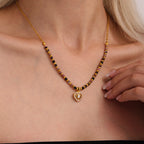 Parure en pierres naturelles et acier inoxydable doré