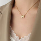 Collier Papillon Doré en Acier  Élégance & Raffinement