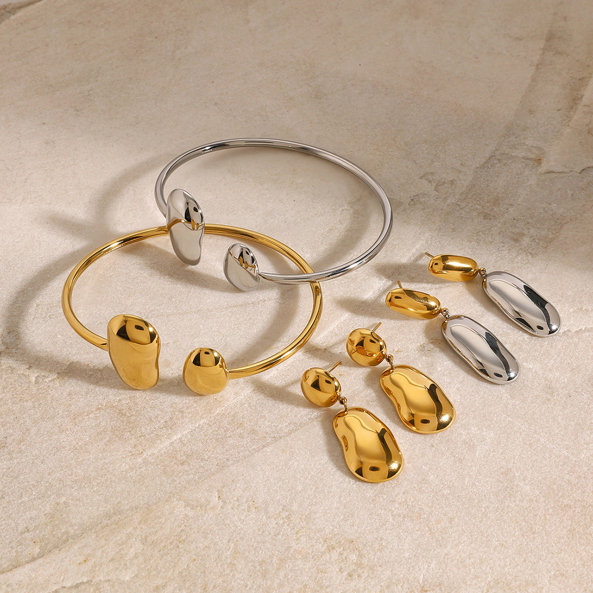 Jieding European and American stainless steel water drop open bracelet premium sense earrings niche bracelet earrings titanium steel jewelry cross-border