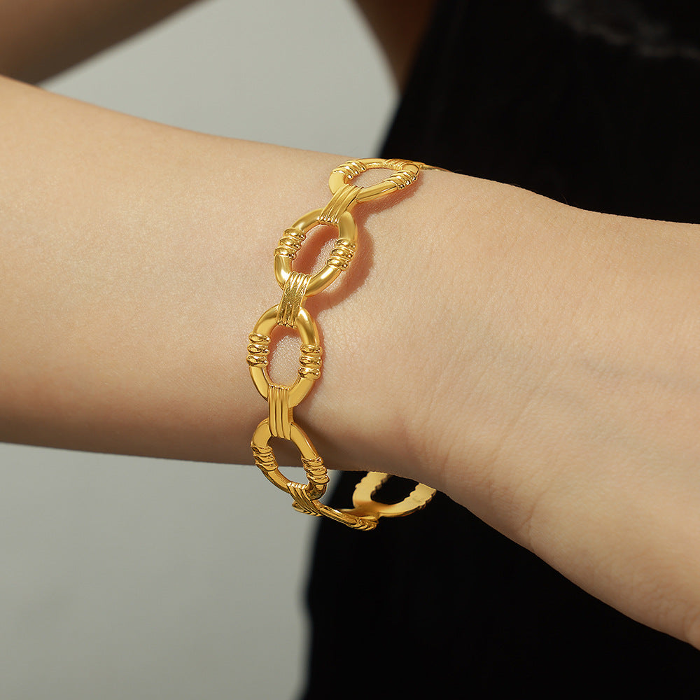Bracelet Gaïa d'Or  Acier  doré, design géométrique ajouré