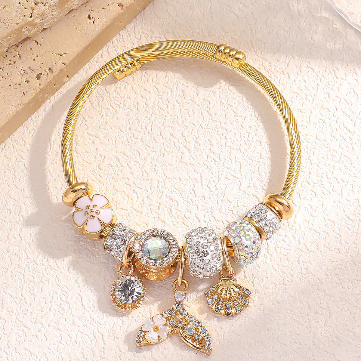 Bracelet femme en acier inoxydable doré  Charms coquillage & queue de poisson